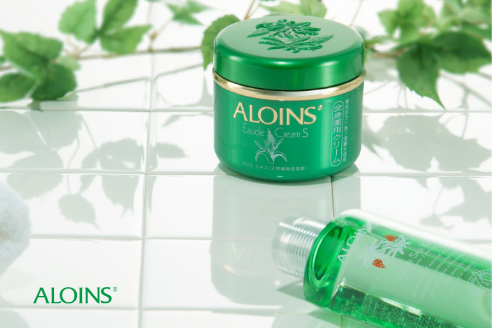 ALOINS product packaging with botanical and natural care theme