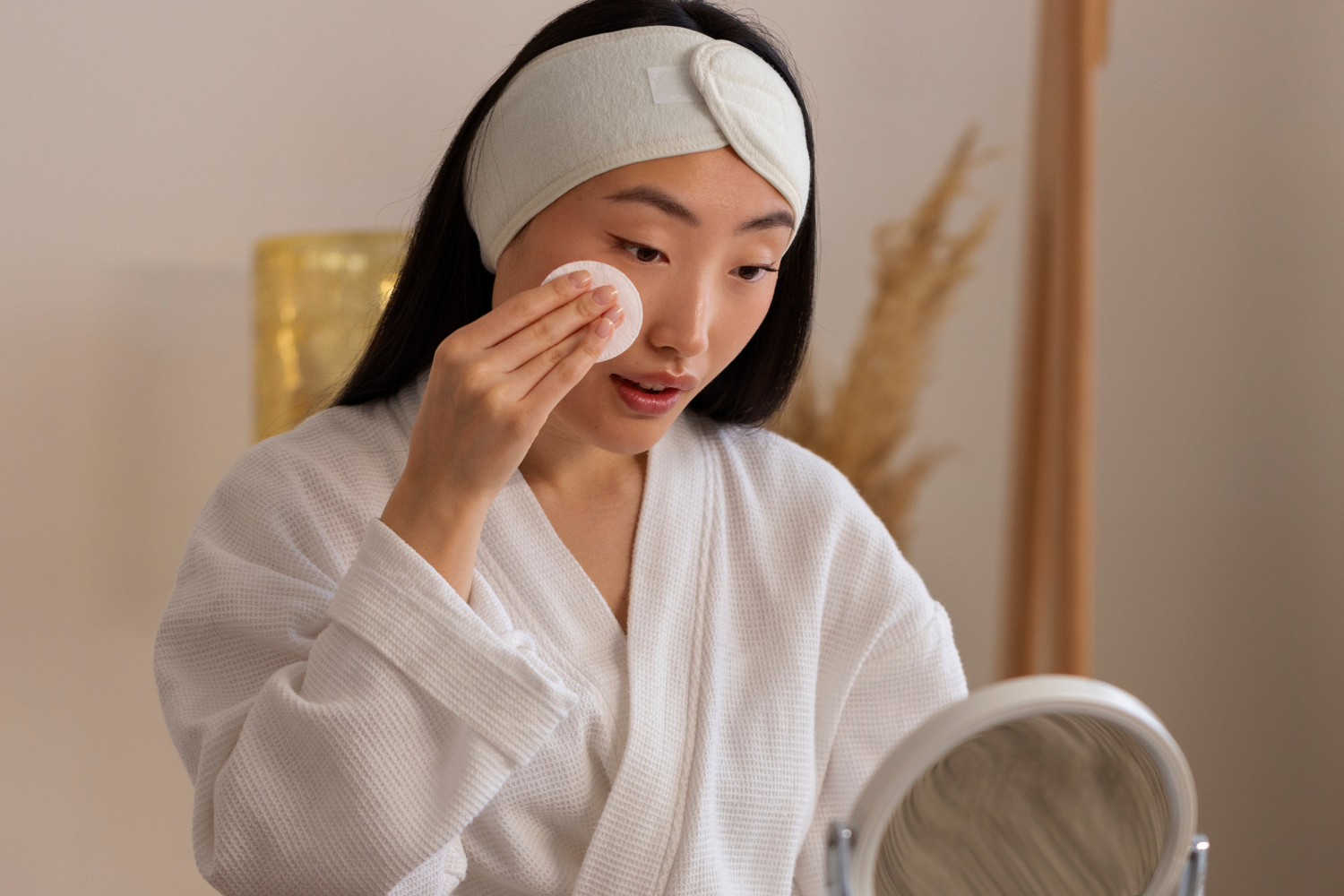 Japanese girl cleansing her face