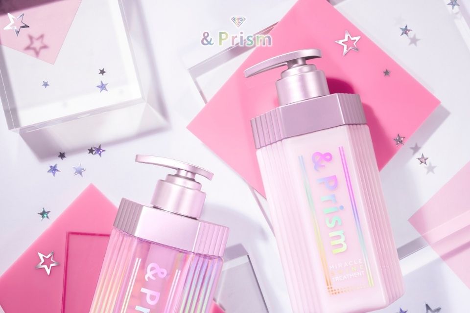 "&Prism hair care products on pink background, showcasing MIRACLE SHINE and DIAMOND SHINE series. Promotes 156% shine with platinum serum, moisture, and smoothness with pearl extract, argan oil, and twinkle peony scent."